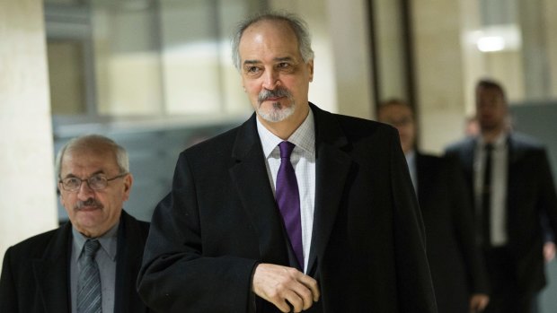 Syrian Ambassador to the United Nations and head of the government delegation Bashar Jaafari, right.