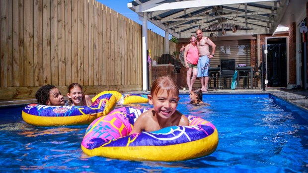 Anna and Peter Tesoriero went over and above safety requirements to ensure their backyard pool was safe for their children. Anna and Peter Tesoriero with Kai, 5, in front. Friend Alizea with Eva, 9, and Zoe, 11 in the middle. 