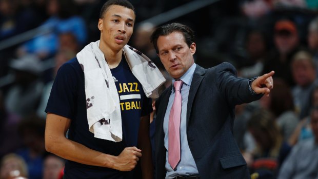 Australian guard Dante Exum receives instruction from Utah Jazz head coach Quin Snyder.