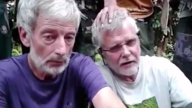 Canadians Robert Hall, left, and John Ridsdel, right, were beheaded by Abu Sayyaf. 
