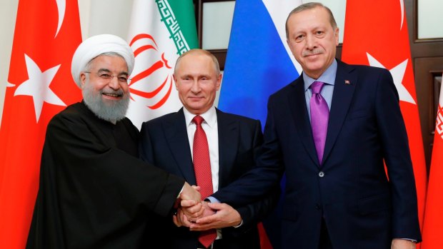 Growing friendship: from left, Iranian Hassan Rouhani, Russian President Vladimir Putin and Turkish President Recep Tayyip Erdogan in talks in Russia last month.