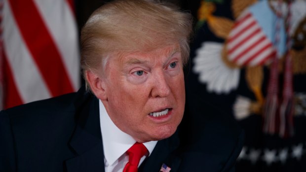 US President Donald Trump warns North Korea during a press conference at the Trump National Golf Club.