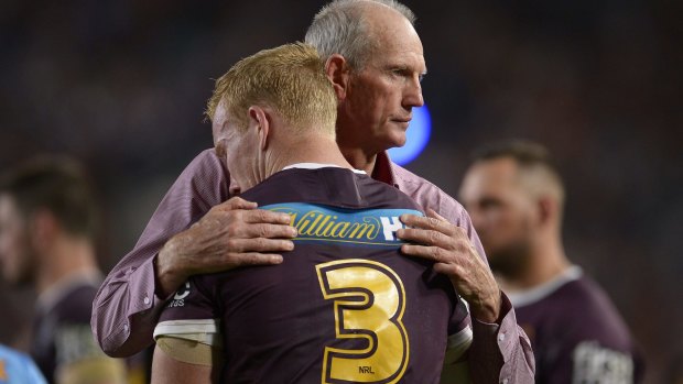 "I love being their coach": Wayne Bennett consoles Jack Reed after the grand final loss to the Cowboys.