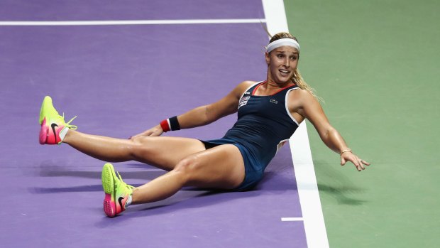 Big moment: Dominika Cibulkova of Slovakia celebrates victory in her final against Angelique Kerber of Germany in Singapore. 