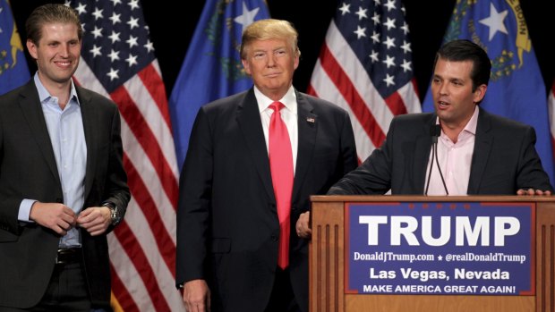 Donald Trump Jr., right, with his father, Donald Trump, centre, and his brother, Eric Trump, left in Las Vegas in January.