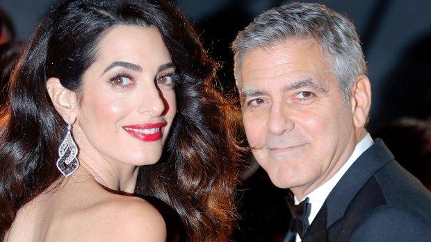Amal and George Clooney at the 42nd Cesar Film Awards in Paris earlier this year are only now discovering the cost of fame.