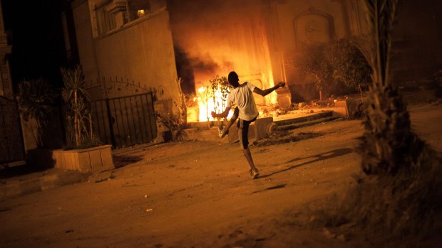 Violence in June 2013 saw protesters attack the Muslim Brotherhood headquarters in Cairo. 