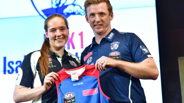 Isabel Huntington at the AFLW draft with Western Bulldogs coach Paul Groves.
