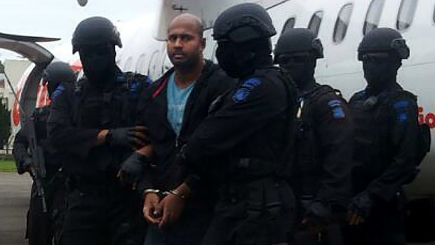 Myuran Sukumaran handcuffed arriving at Cilacap airport.