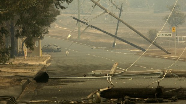 The aftermath of the 2003 bushfires in Darwinia Terrace, Chapman.