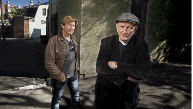 Paul Cox (right), with actor David Wenham, outside his Albert Park office last year. 