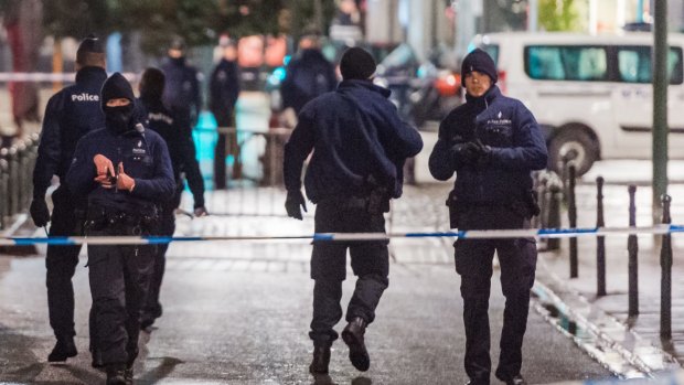 Police close streets near the Grand Place in Brussels in November. Police found material that could be used to make explosives and handmade belts during a raid on a Brussels apartment on December 10.