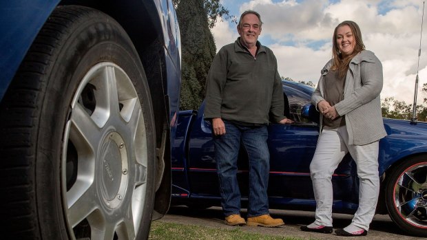 Mt Druitt residents Warren Purdie and daughter Shannyn symbolise Sydney's love affair with car ownership.
