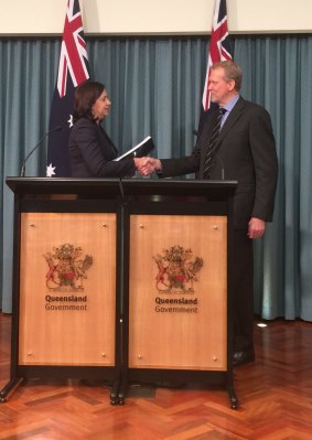 Greyhound commission of inquiry chairman Alan McSporran, QC, delivers his report to Premier Annastacia Palaszczuk.