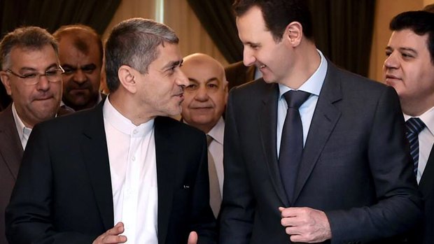 Syrian President Bashar al-Assad, right, meeting Iranian Finance Minister Ali Tayebnia in Damascus.