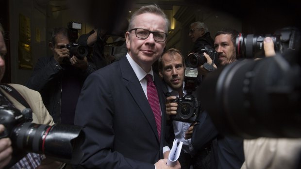 Michael Gove, UK justice secretary, is surrounded by photographers as he arrives for a news conference to announce his Conservative party leadership bid in London on Friday.