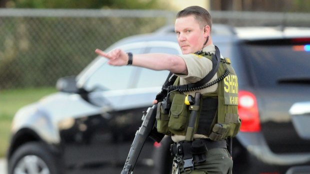 Police near the scene of the shooting in San Bernardino. 