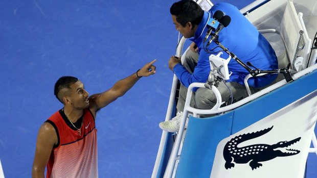 Nick Kyrgios of Australia argues with the chair umpire.