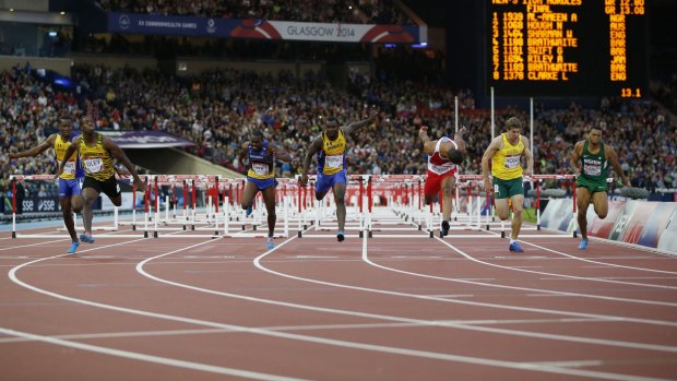 Andrew Riley of Jamaica (2nd L) wins the gold medal in the men's 110m hurdles. Australia's Nicholas Hough (2nd R) finished fourth.