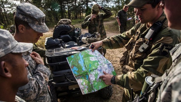 US and Norwegian soldiers coordinate during Saber Strike 2015, a training exercise that also included forces from Britain, Canada, Denmark, Estonia, Finland, Germany, Latvia, Lithuania, Poland, Portugal and Slovenia. 