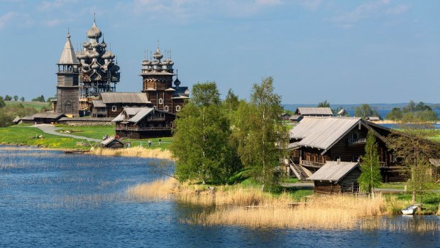 Kizhi Island, Russia, features a  collection of historic wooden buildings.