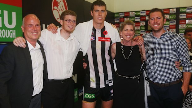 Mason Cox celebrates the win with his family.