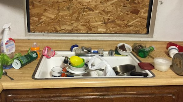 Dirty dishes can be seen in the home.