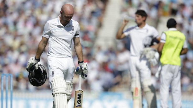 Making the long walk: England's Adam Lyth walks off the pitch after being given out caught by Australia's Michael Clarke off the bowling of s Peter Siddle.
