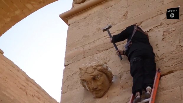 Islamic State extremists at Iraq's ancient city of Hatra destroyed the archaeological site by smashing sledgehammers into its walls and shooting Kalashnikov assault rifles at priceless statues.