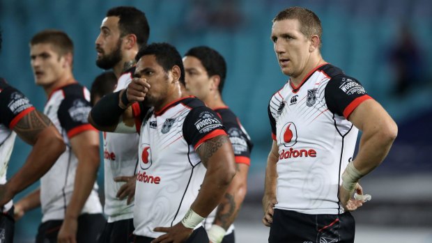 Searching for answers: Warriors players look dejected after conceding a try.