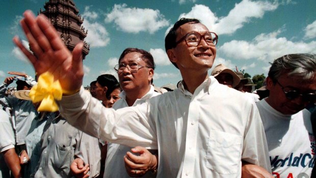 A younger Sam Rainsy leads an anti-government rally in 1998.