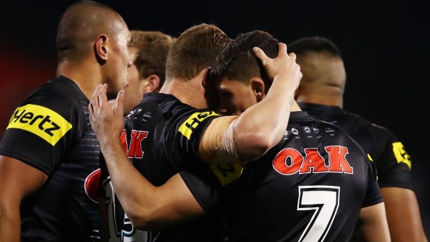 Well done: Nathan Cleary celebrates with Penrith teammates after scoring.