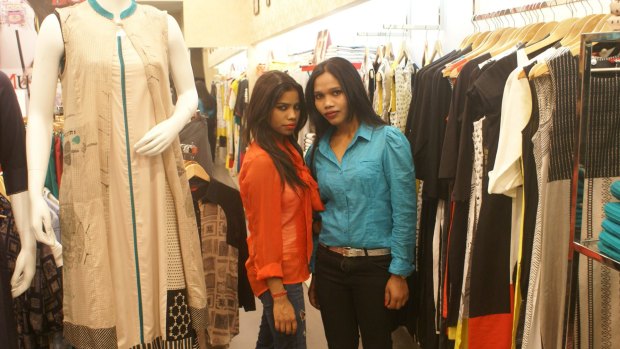 Domestic workers Alvisiya and Sarita in a shop in Delhi. They want time to have their own lives outside work.