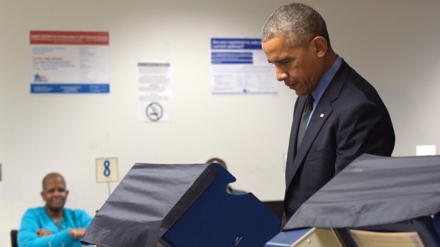 President Barack Obama votes early in Chicago.