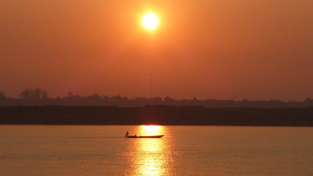 Sunset fishing on the Mekong.