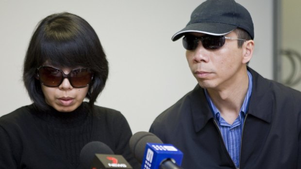 Robert Xie , here with his wife Kathy Lin, has pleaded not guilty to the charges.