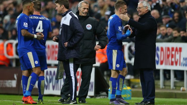 Leicester City manager Claudio Ranieri congratulates Jamie Vardy after replacing him during the match against Newcastle United on November 21.
