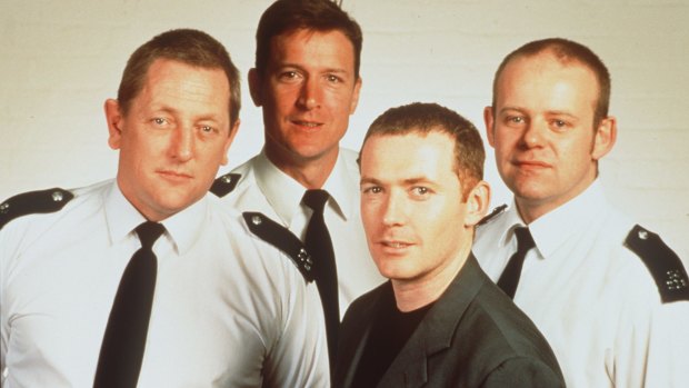 Old Bill: Huw Higginson (far right) during his days on <i>The Bill</i>.