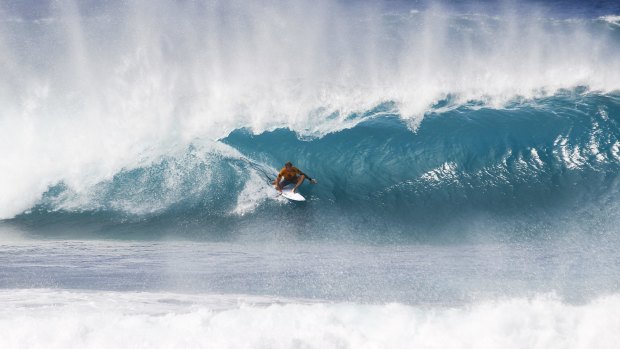 Tube: Mick Fanning in action at Pipeline.
