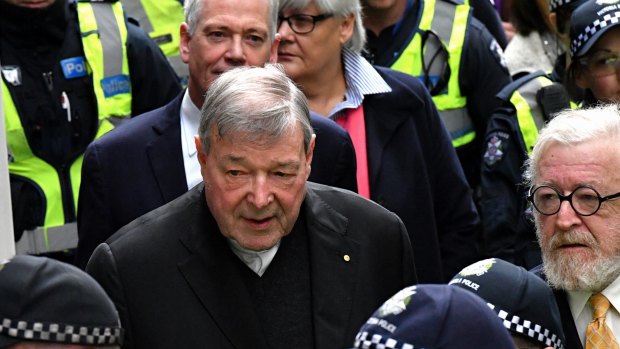 George Pell leaves the Magistrates Court on Friday. 