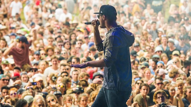 Illy on stage performing live at Falls Festival.