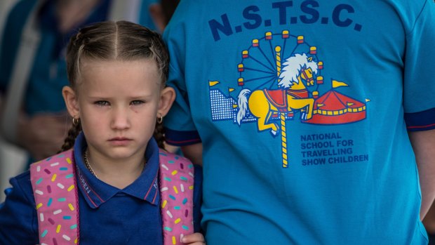 Unusual logo: Mekia McDonald, left, and sister Chivani, with the National School for Travelling Show Children's quirky logo.