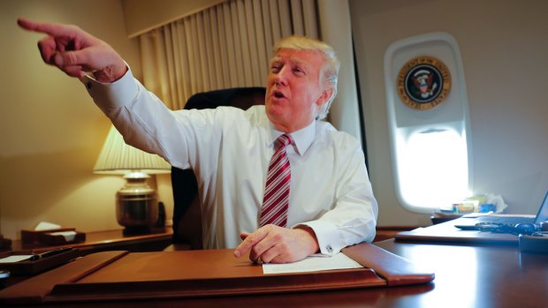 President Donald Trump on Air Force One on Thursday.