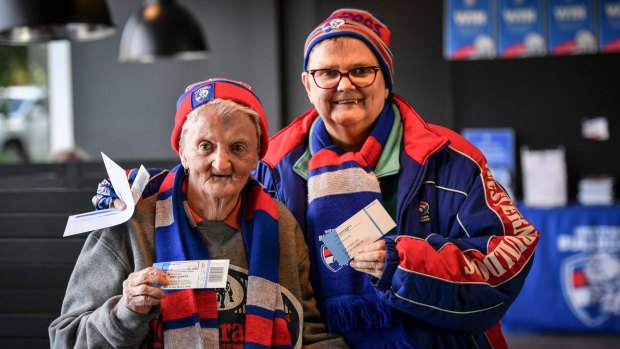Betty Hayes and daughter Jackie Hall show off their tickets on Monday.