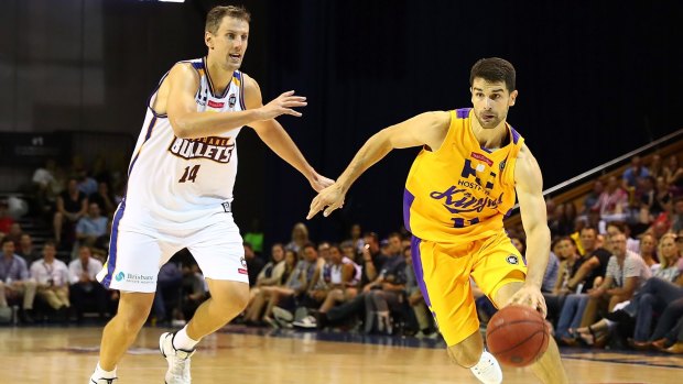 Late Charge: Kevin Lisch (right) let go of early shooting woes to lead Kings to win