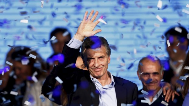 Mauricio Macri, Buenos Aires' Mayor and presidential candidate, waves to supporters in Buenos Aires on Sunday.