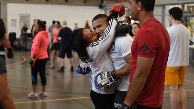 Happier days: Jamil Hopoate gets a kiss from his mum. 
