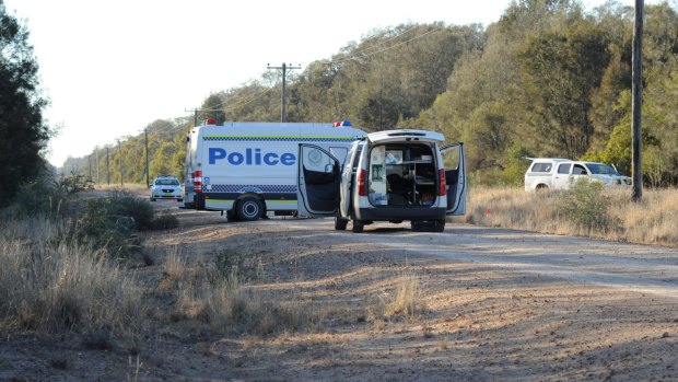 Police block off the road at Talga Lane on the Newell Highway at Croppa Creek after Tuesday's fatal shooting. 