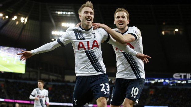 Tottenham's Christian Eriksen, left, celebrates  with Harry Kane after scoring his side's winner.