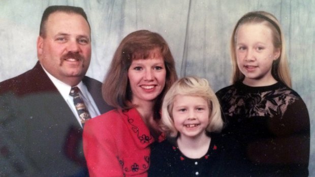 BEFORE: Cory Slagle with his family before he started using the Fitbit.